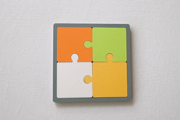 Jigsaw Coaster 3D Print File: A Modern Puzzle Design